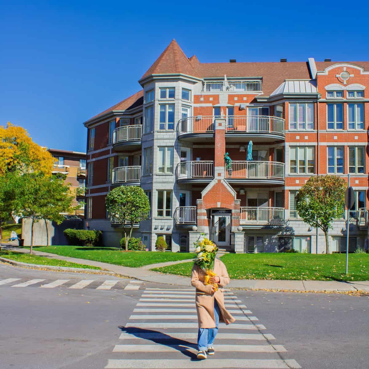 Person holding a bouquet on a residential street in LaSalle, Montreal